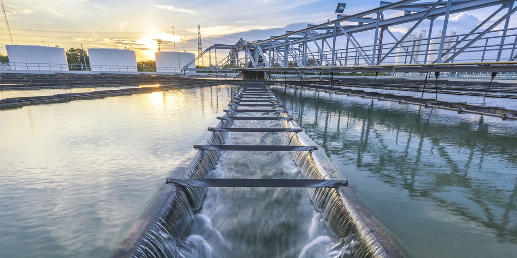 Picture of an outflow from a clarifier in a wastewater treatment plant Picture of an outflow from a clarifier in a wastewater treatment plant